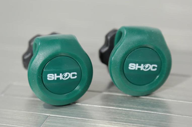 A pair of SHOC Kelly Green Vipor Clips 