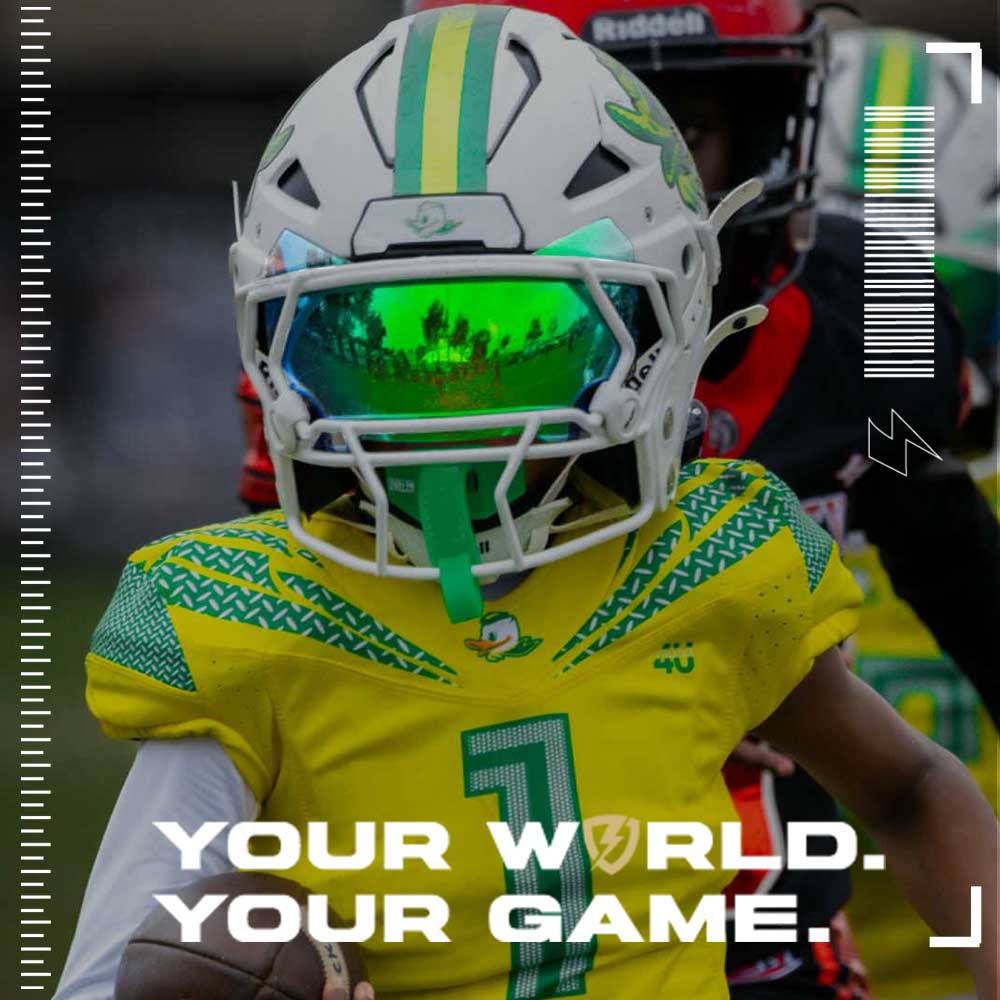 A youth football player wearing an Riddell Axiom football helmet, and a Northern Lights SHOC Visor, and a yellow jersey with text 'Your World. Your Game.'