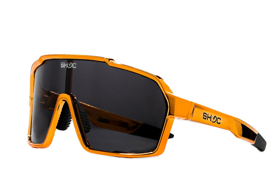 SHOC Waves Sunglasses! The best golden wraparound sunglasses made by the indie sports brand, SHOC.